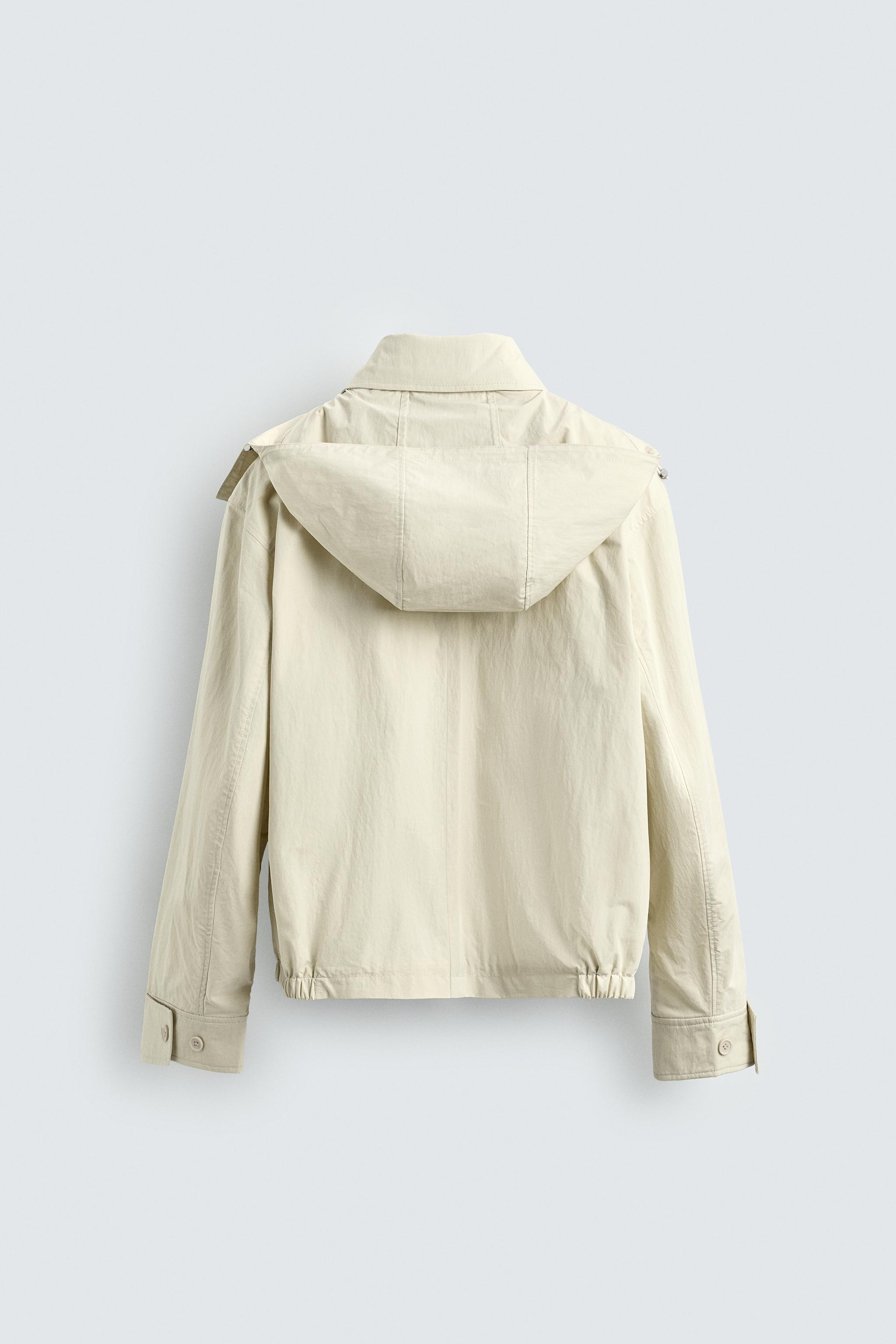 PARKA TECHNIQUE COURTE À CAPUCHE